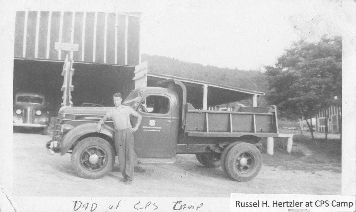 Russell Hertzler with Truck